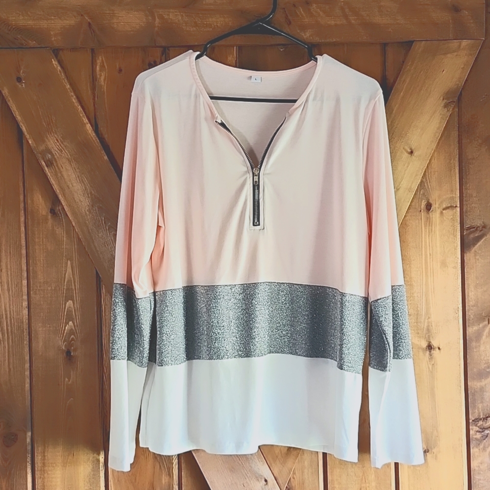 Ladies  quarter zip top. Size large.